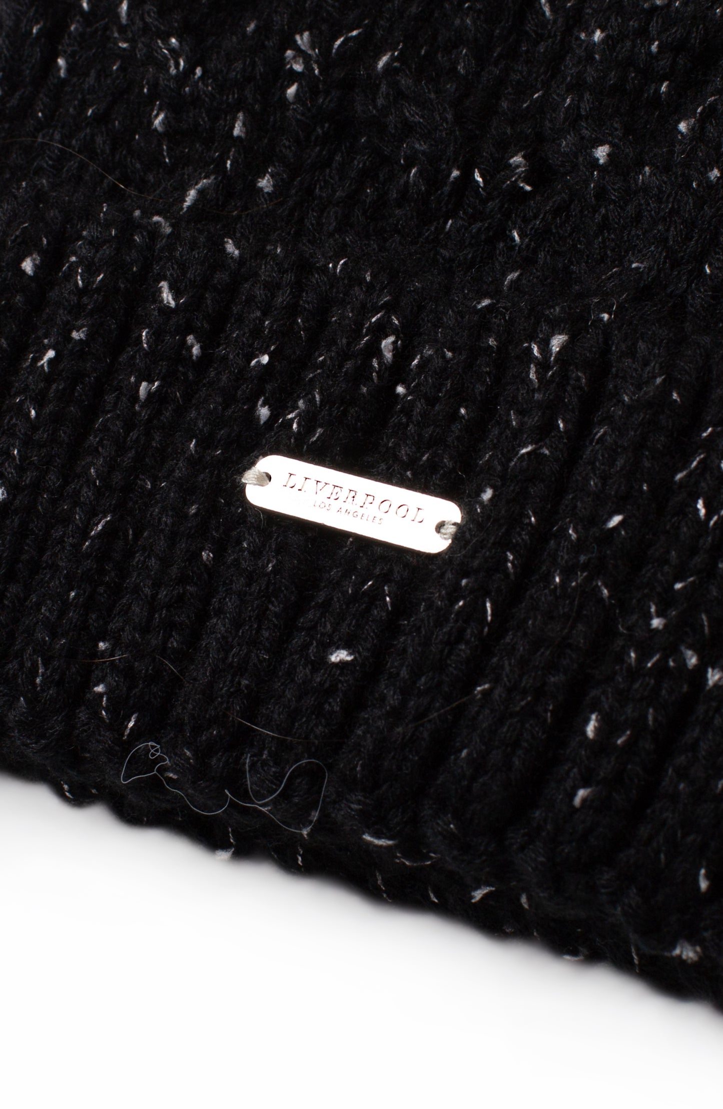 Liverpool Cable Knit Beanie w/ Fax Fur Pouf (Black w/ White Flakes)